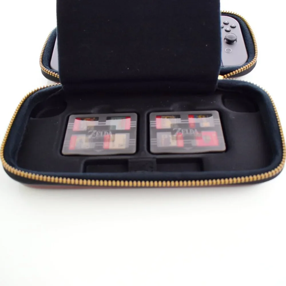 Nintendo Switch HAC-001 32GB Console with Gray Joy‑Con, Zelda case & 8 games inc